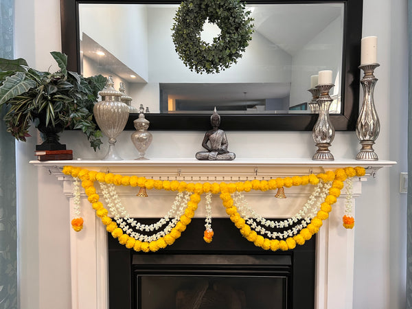 modern indian wedding decor in US, marigold garld looks real, reuse toran , door toran, wedding marigold decor 